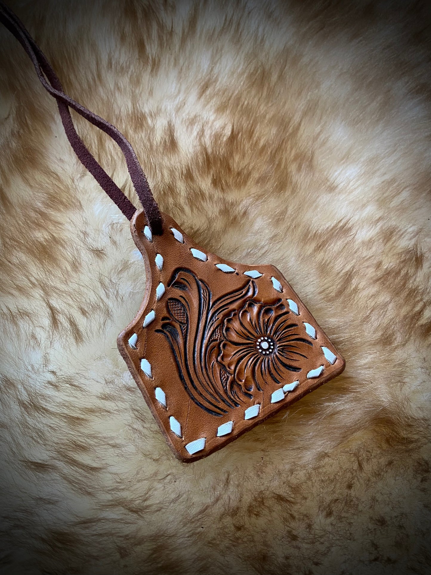Leather Tooled Ear Tag With Buckstiching